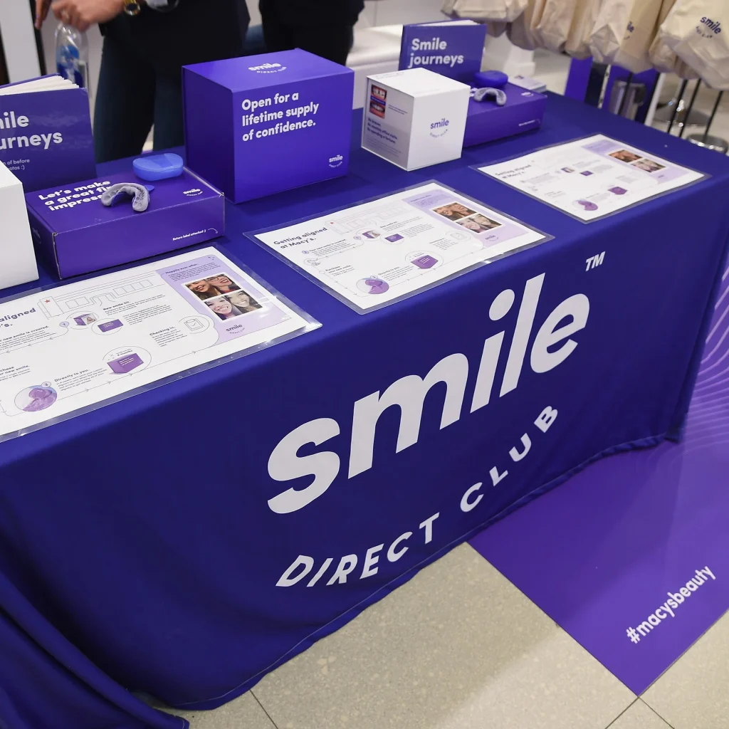 The SmileDirectClub lawsuit update includes three major settlements totaling nearly $48 million: a $31.75M antitrust settlement (final approval November 2025, claim deadline passed October 27, 2025), a $4.8M refund for customers charged after bankruptcy (claim deadline passed March 31, 2025), and a $500K settlement freeing 17,000+ consumers from NDAs. SmileDirectClub permanently closed in December 2023 after filing bankruptcy, leaving millions of customers with incomplete treatments and billions in unpaid claims.